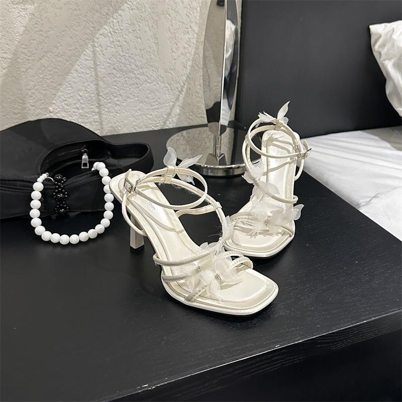 2025 spring and autumn new fashion versatile butterfly French fashion high-heeled sandals women's word open-toed stiletto