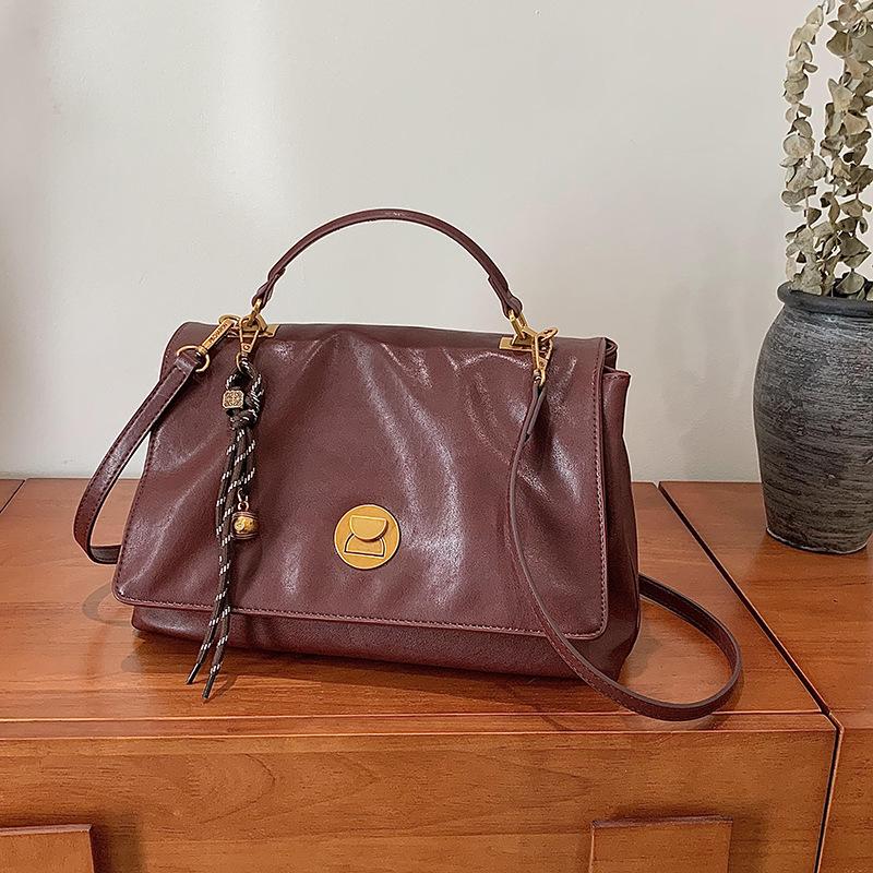 New fashion trend lock official document portable shoulder oblique span women's bag