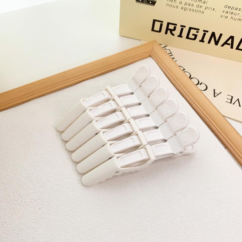 Multifunktionale Alligator-Haarstyling-Klammern zum Locken und Abteilen
