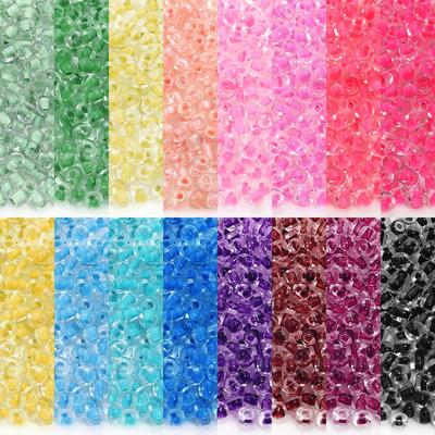 חרוזי זרעים מזכוכית צבועה שקופה בקוטר 4 מ"מ ליצירת צמידים בעבודת יד, שקית 450 גרם