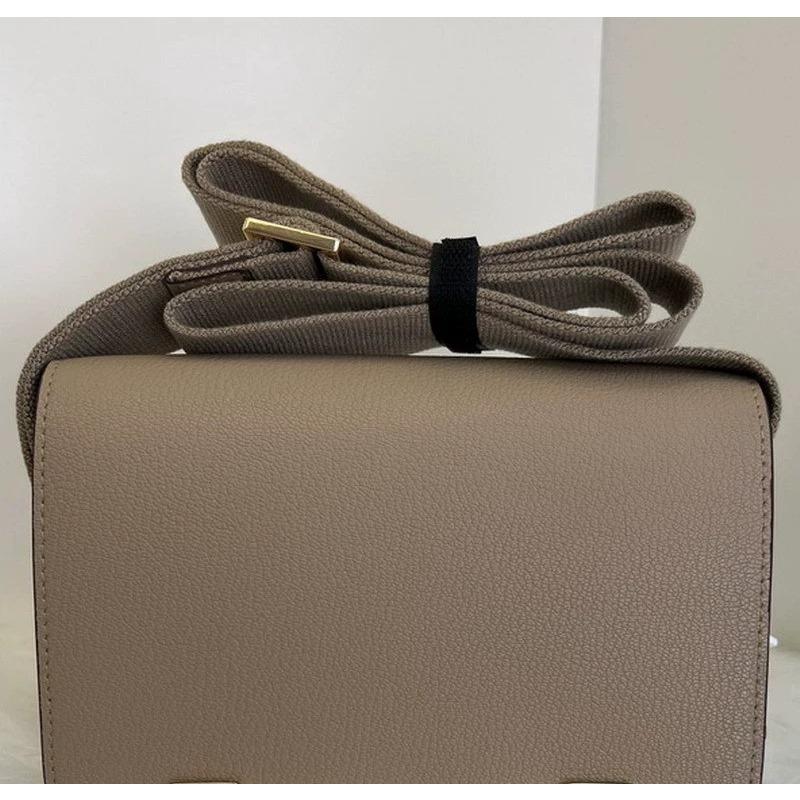 2025 New Leather Women's Bag Goat Pattern Leather Men's and Women's Same Clogs Wide Shoulder Strap Epoxy Leather Color Buckle Cross-border Wholesale