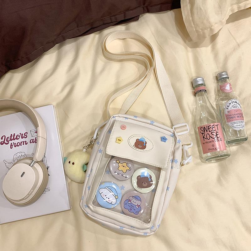 Japanese ins casual girl small bag, versatile messenger bag, cute transparent and painful bag, grain bag, mobile phone bag.