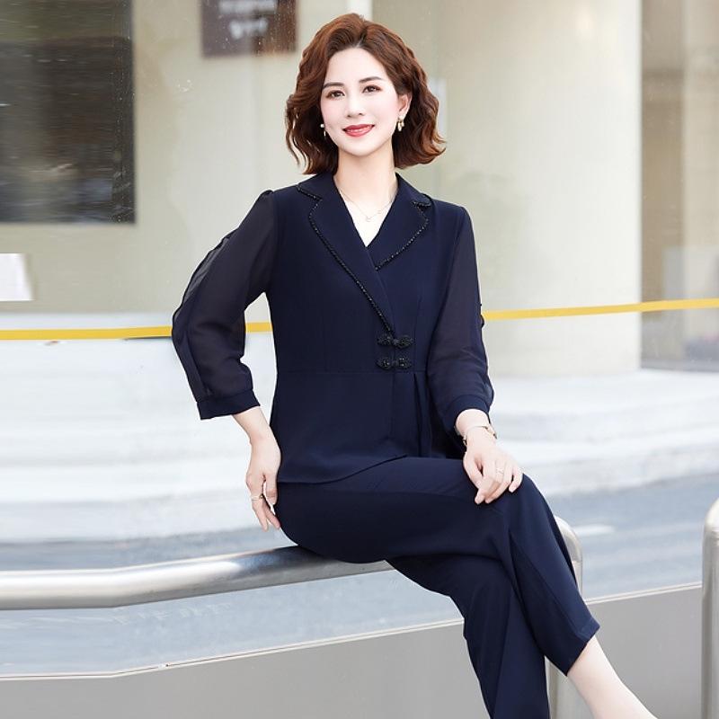 

Elegant Spring Two-Piece Set with Ruffle Lapel Top & Cropped Pants for Middle-Aged and Elderly Mothers 4XL (135-150 lbs)