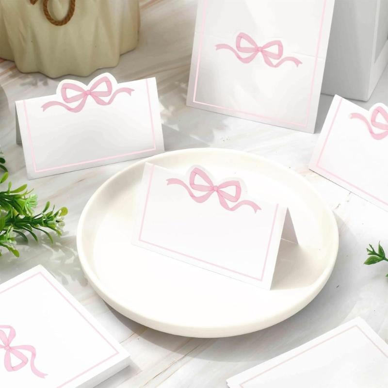 Lot de 100 Cartes de Table Nœud Rose Cartes de Placement Étiquettes vierges d'attribution de place pour Mariages et Réunions Sociales