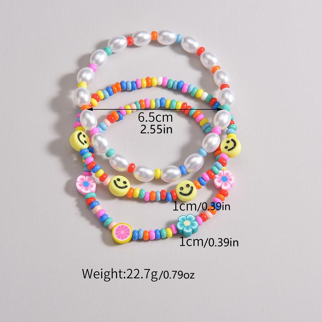 3-piece set of Bohemian style colorful rice beads mixed with smiling face pearls, multiple layered women's anklets