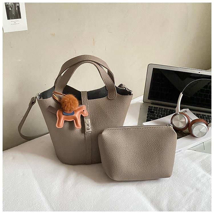 Fashion vegetable basket bucket bag women's 2025 autumn new high-value shoulder bag simple solid color niche messenger bag