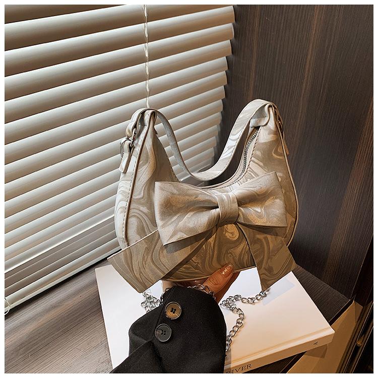 

Large capacity tote bag women s 2024 new fresh and sweet bow shoulder bag fashion temperament double shoulder messenger bag срібний