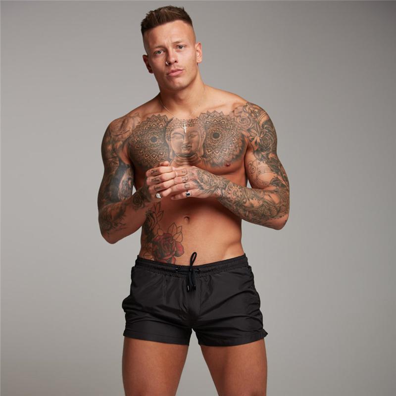 

Muscleguys Gym Bodybuilding Shorts Pocket Jogger Dryfit Training Shorts Plain Mens Running Shorts Summer Quick Dry Fitness Casual Shorts M чёрный