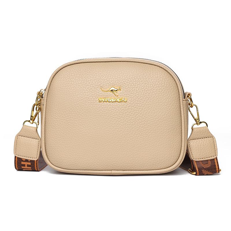 The new women's bag is simple and versatile, small round bag, multi-layer large-capacity shoulder messenger bag.