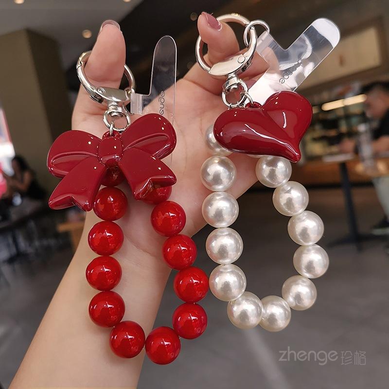 Butterfly love round bead mobile phone chain ins fashion women's hand chain wrist pendant bead pendant bag pendant