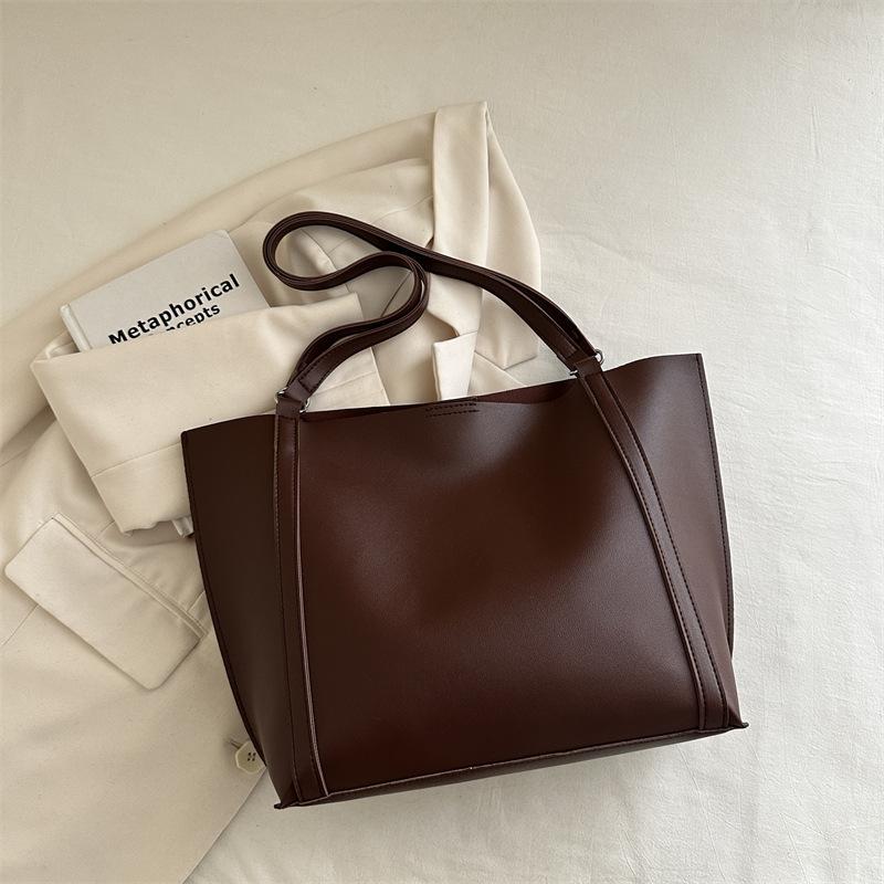 

Ретро сумка большой вместимости женская 2025 новая модная ретро сумка-тоут универсальная нишевая на одно плечо сумка для мамы и ребенка коричневый