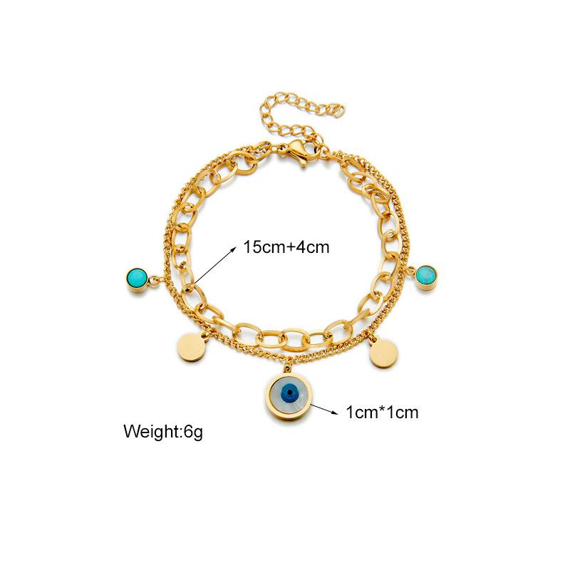 Gold Tone Double Layer Evil Eye Charm Bracelet with Turquoise Accents