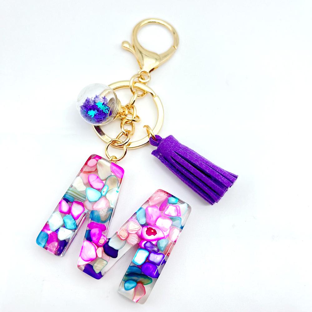 Breloc inițial englezesc de vânzare la cald european și american cu accesoriu cu ciucuri violet