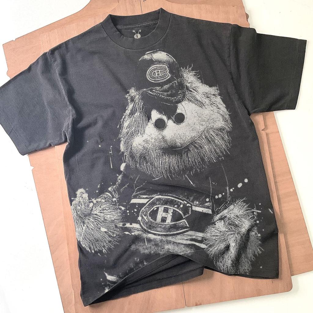 Youppi Bleached T-Shirt: Vintage Ice Hockey Mascot Faded Black Cotton Unisex Tee