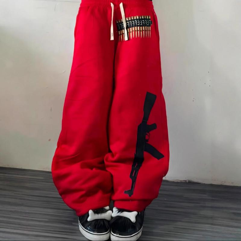 Podzimní a zimní trendy vzorované ležérní hip hopové volné kalhoty pro muže a ženy