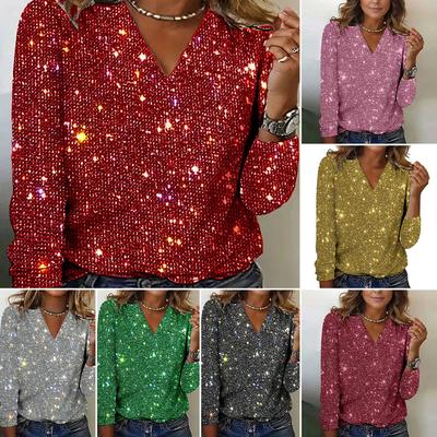Top alla moda ed elegante con scollo a V, maniche lunghe e paillettes