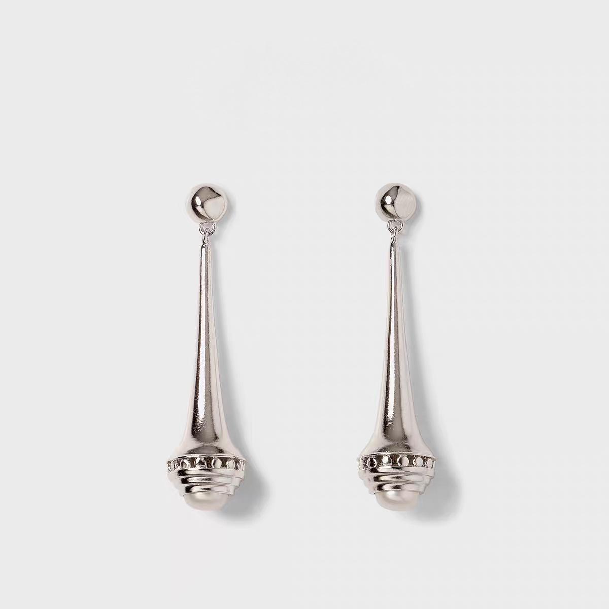 

Elegant 3D Abstract Bottle Stud Earrings: Versatile, Retro, and Stylish for Women срібний