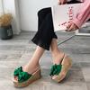 Slippers women's summer non-slip 2025 new ultra-fashionable thick-soled outer wear beach outdoor one-word flower Korean version of high heels
