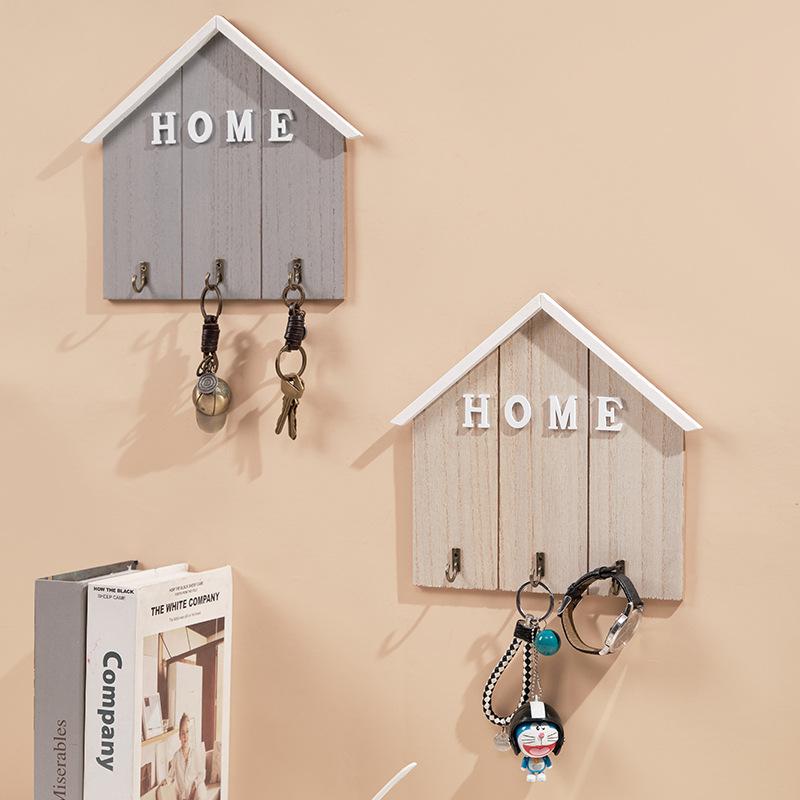 Řada kreativních nástěnných háčků pro zavěšení klíčů do vstupní chodby