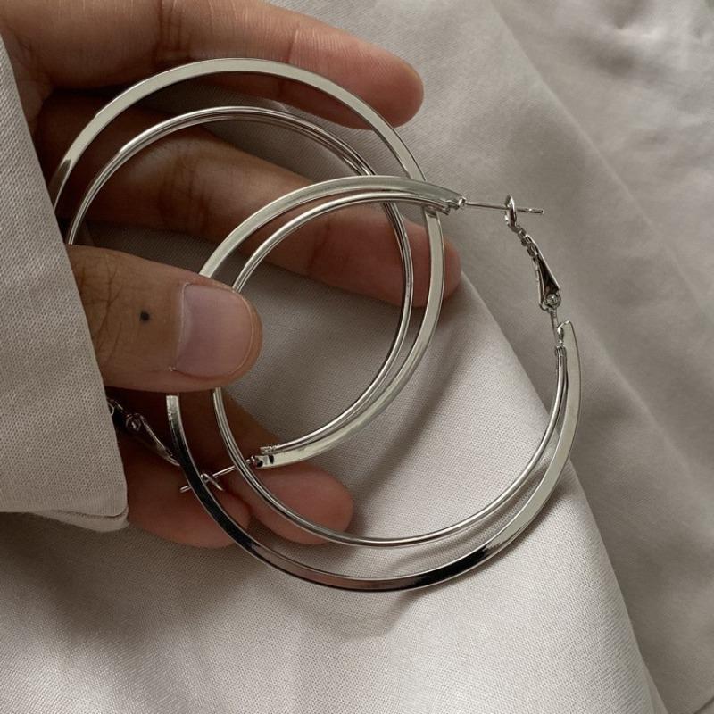 Silver plain ring earrings women's light luxury high-end stud earrings 2026 new popular niche exaggerated temperament earrings earrings