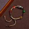 Adjustable Tibetan Handcrafted Dzi Bead Bracelet with Auspicious Hand-Rubbed Cotton Cord