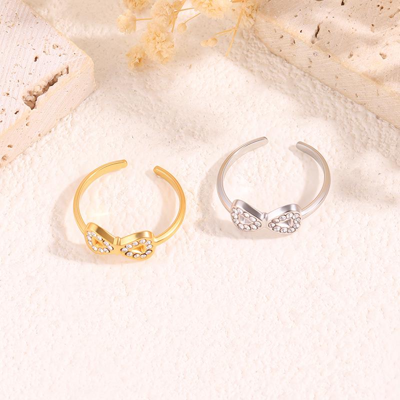 Elegant Diamond Inlaid Titanium Bow Ring for Women – Non-fading, High-End Luxury Jewelry