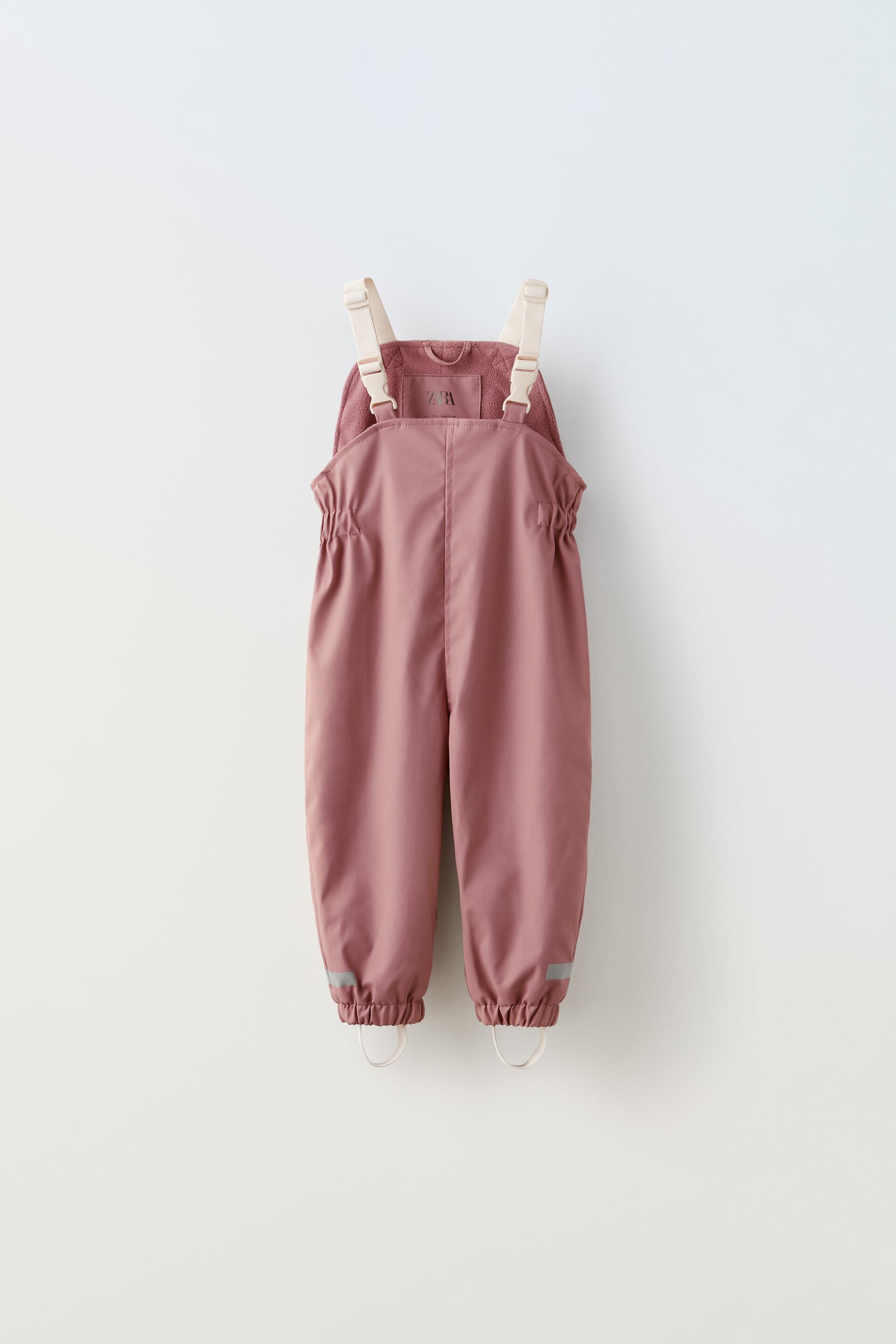 

КОМБИНЕЗОН ИЗ ПРОРЕЗИНЕННОГО ФЛИСА