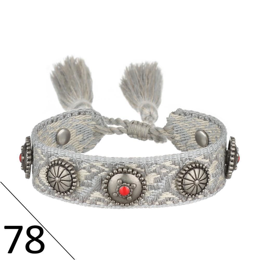 European Woven Bracelet with Metal Nail Buckle and Tassel for Women