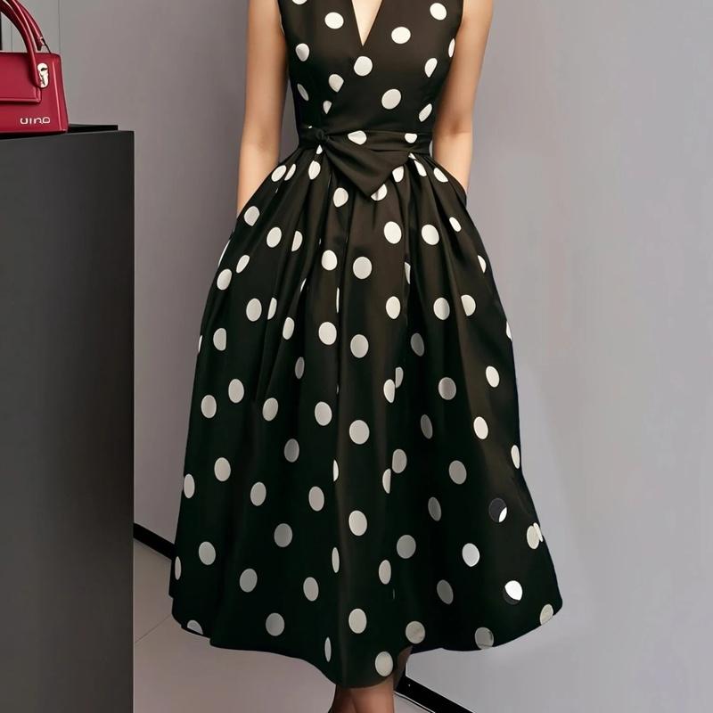 Abito midi a pois da donna senza maniche con colletto a revers e bottoni Vestito svasato