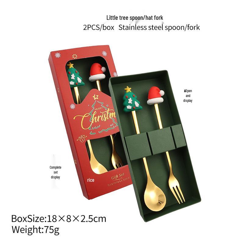 Christmas Cartoon Cutlery Set: Forks, Spoons, and Gift Box Featuring Cute Reindeer and Tree Designs.