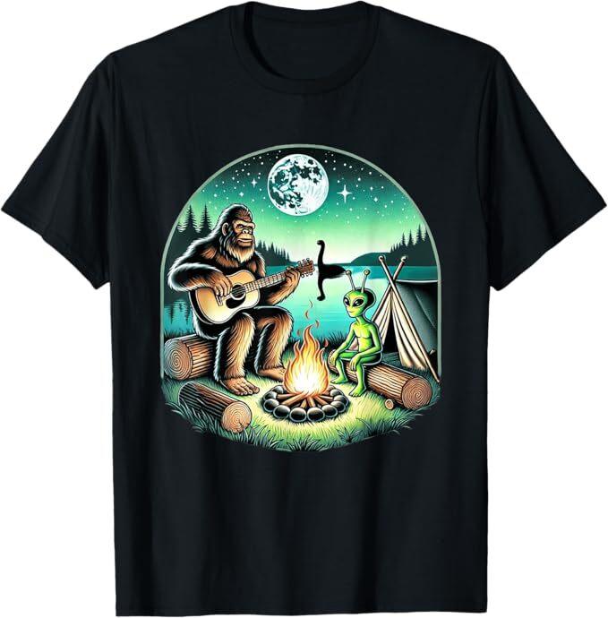 

Alien and Bigfoot Loch Ness Campfire Sasquatch Guitar T-Shirt L