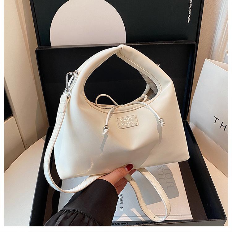 Niche bag women's 2025 spring and summer new fashion messenger bag high-end casual portable dumpling bag