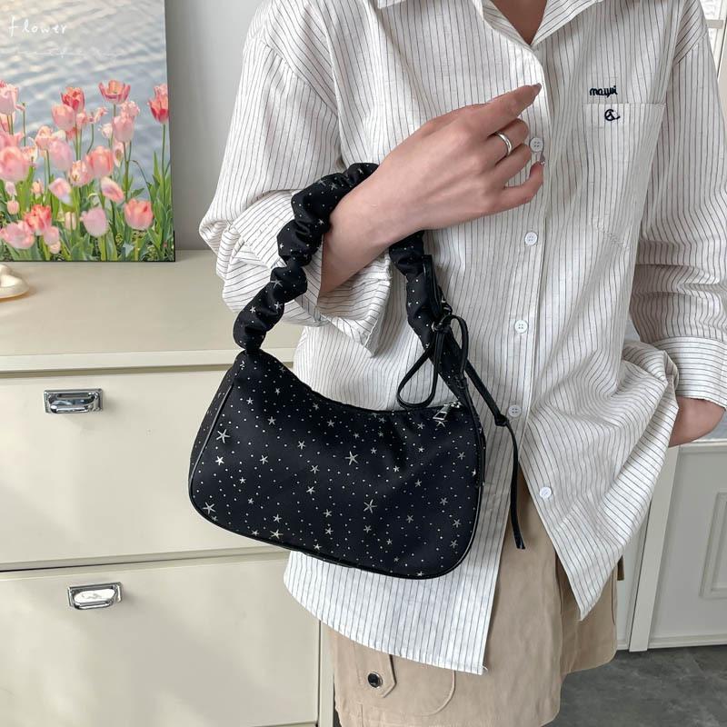 Niche design star underarm bag women's new pleated shoulder bag commuter bag highend versatile canvas bag
