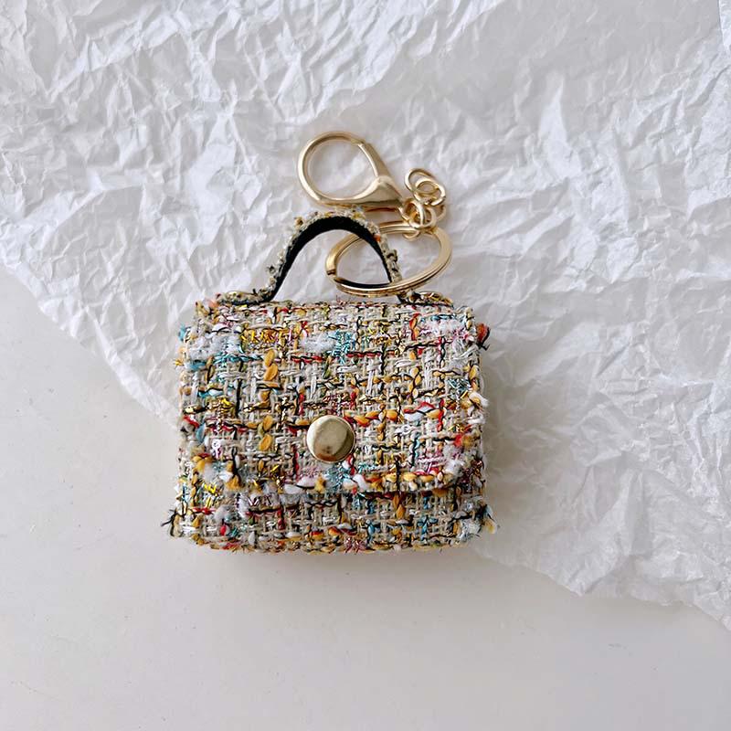 Fashion Mini Bag Keychain: Charm Pendant, Backpack, Handbag, Coin Purse, and Earphone Storage.