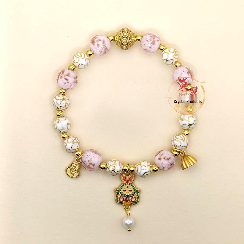 White Cloisonné Rabbit God Lotus Bracelet with Luminous Beads and Gold Sand Glaze.