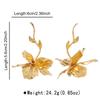 2025 New Vintage Metal Flower Pendant Earrings for Women Creative Gold Color Leaf Irregular Earrings Vacation Zircon Gifts
