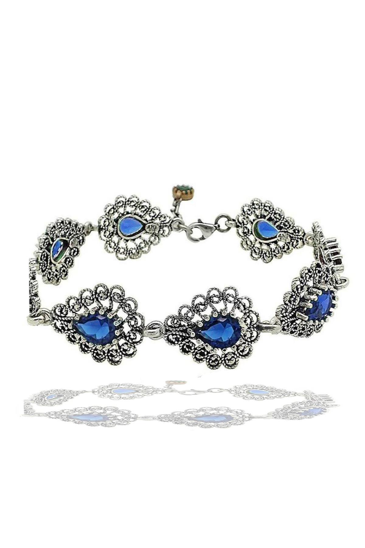 

Женский браслет с филигранным серебряным камнем и сапфиром серии Miras