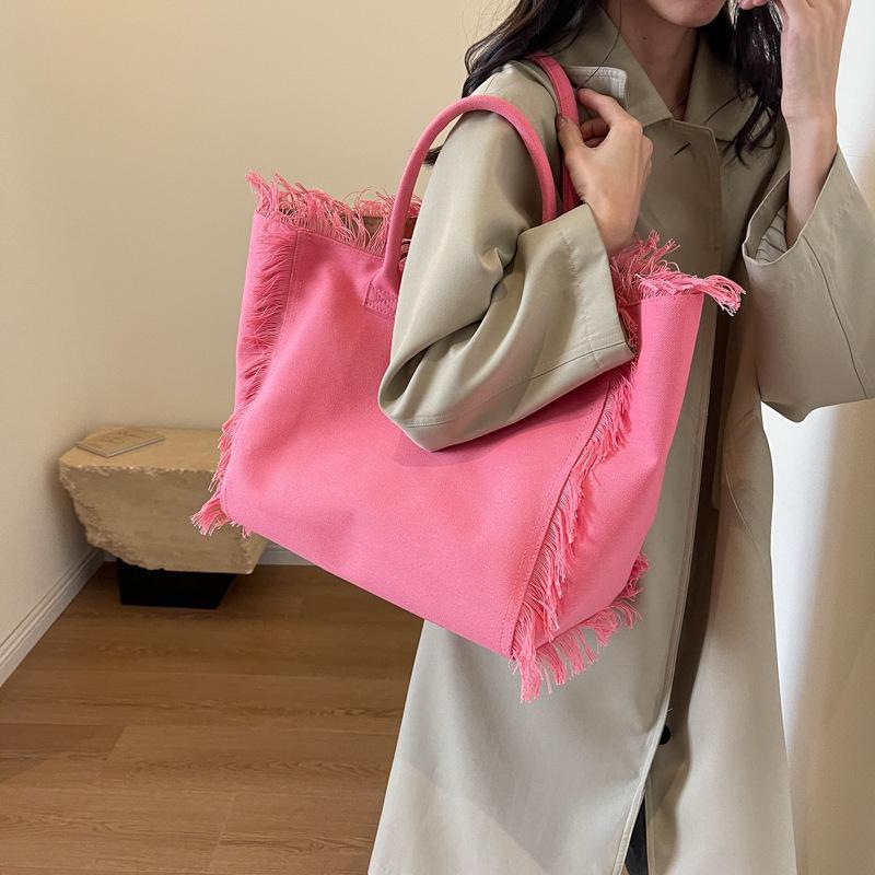 2024 Autumn/Winter Korean Tassel Canvas Tote - Large Capacity, Simple Style, for Women Students, Commutes, Shoulder Carry.