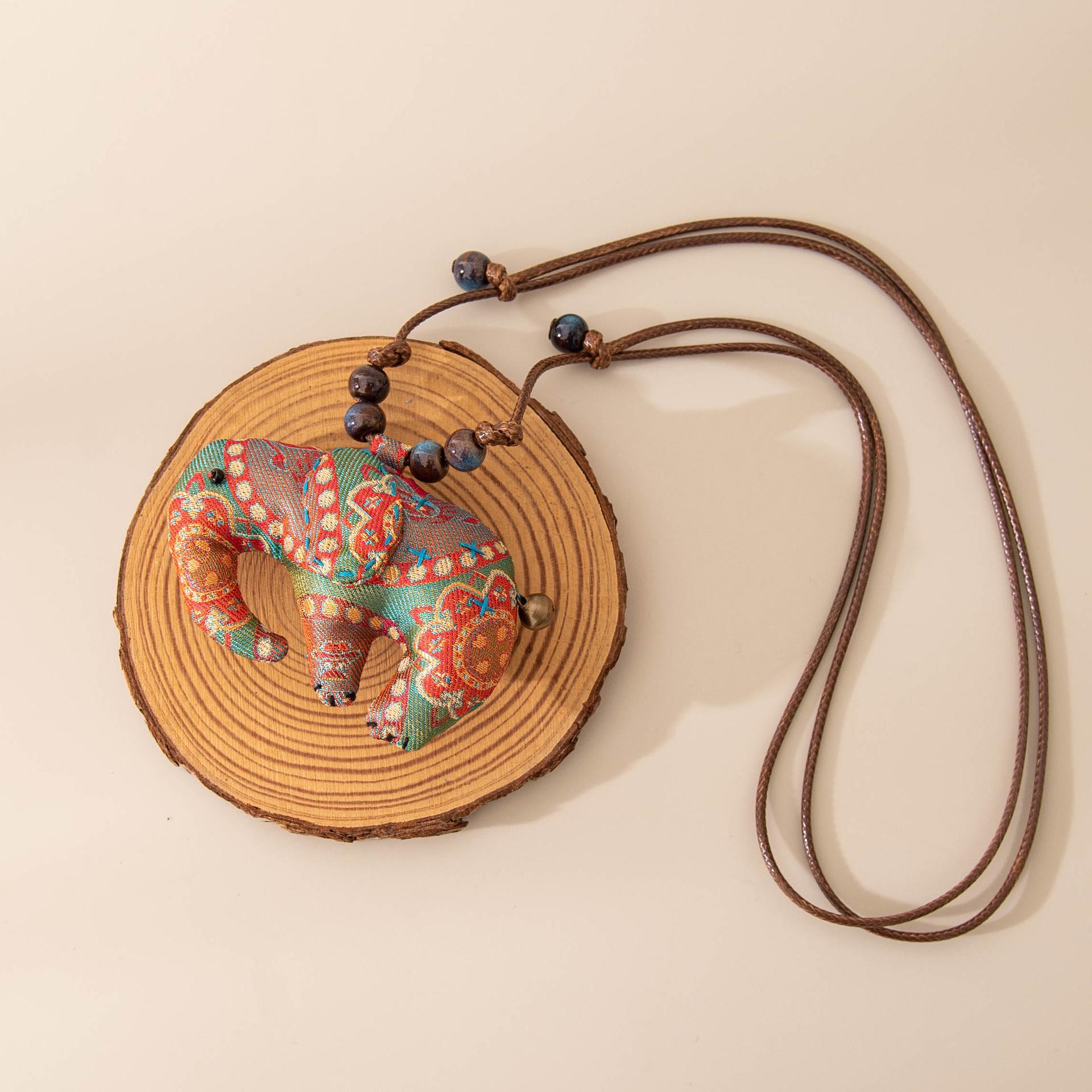 

Silk Elephant Pendant Necklace – High-End Chinese Ethnic Design
