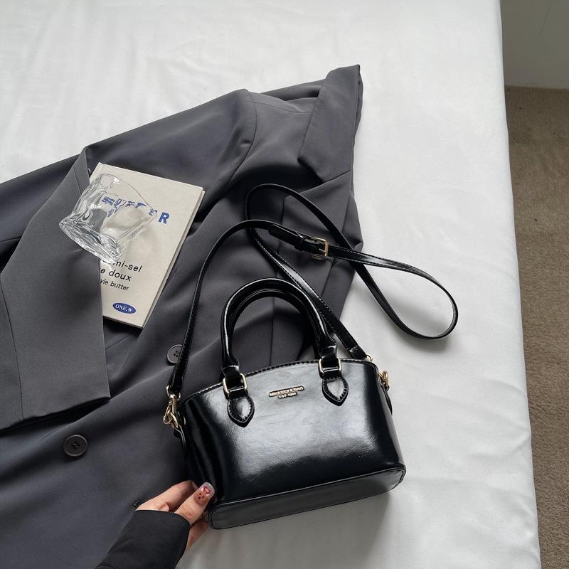 

Премиальная текстура маленькая сумка женская новая портативная сумка-ведро нишевый дизайн легкая роскошная сумка через плечо