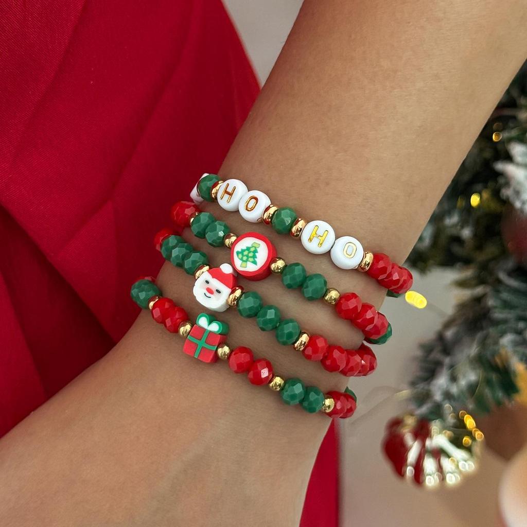Świąteczny zestaw bransoletek z koralikami i bałwankiem z polimerowej gliny