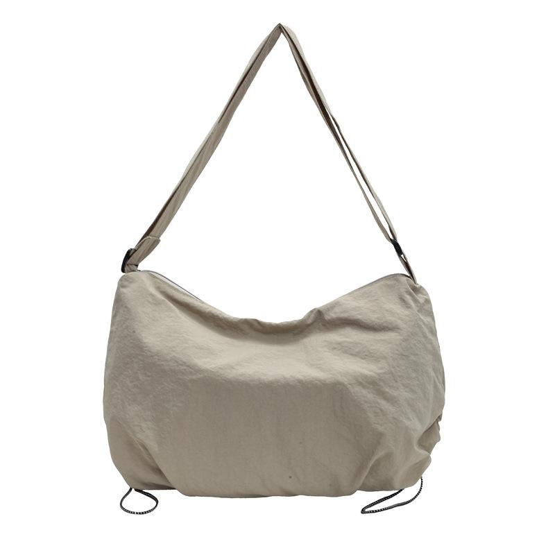 Simple Solid Color Nylon Crossbody Bag Pleated Drawstring Design Cloud Bag Lightweight and Versatile Commuter Shoulder Dumpling Bag