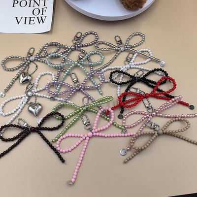Llavero colgante de lazo de amor plateado para teléfonos - Exquisito accesorio de regalo pequeño