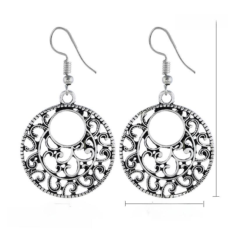 Tibetan Ethnic Earrings: Retro Hollow Pattern from Nepal & Yunnan