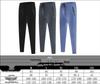 2024 Quick-Dry Men's Solid Color Athletic Pants with Drawstring & Zipper