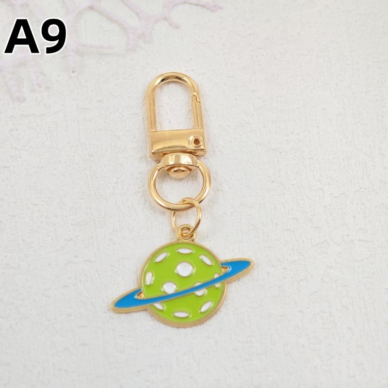 1/5Pcs Creative Pickleball Racket Metal Keychain Colorful Hollow Golf Ball Keychains Dink Ball Fans Party Gift Bag Pendant
