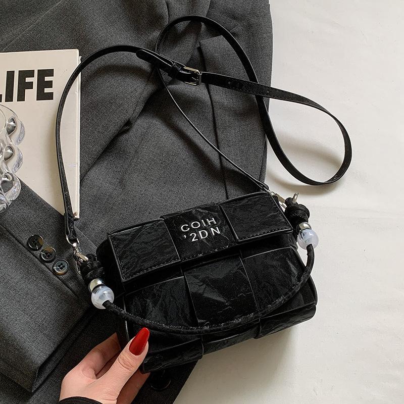 Spring and summer hot sale versatile high-end woven grid portable small square bag Korean version casual fashion commuter messenger women's bag