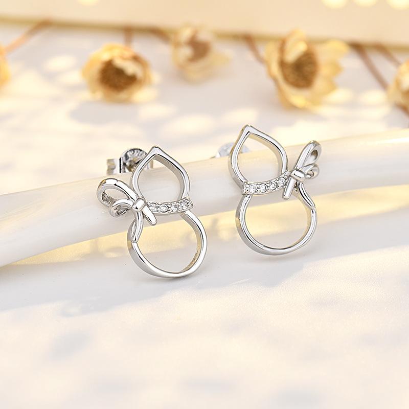 Neues Produkt Schlichte und vielseitige kleine Kürbis-Ohrringe Exquisite frische süße Nischendesign Mikro-eingelegte Ohrringe