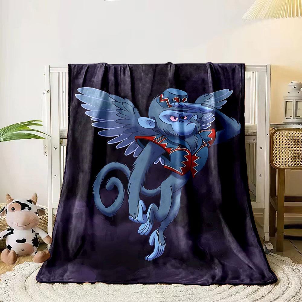 

A flying monkey with wings, wearing a hat and colorful clothing. for all seasons blanket lunch break throw gift 80cm x 120cm