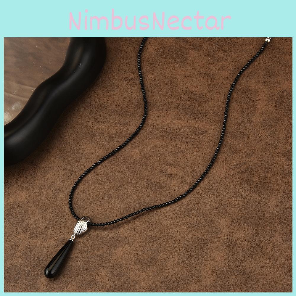 Contemporary Black Onyx Pearl Necklace With Exquisite Gemstone Inlays And Geometry